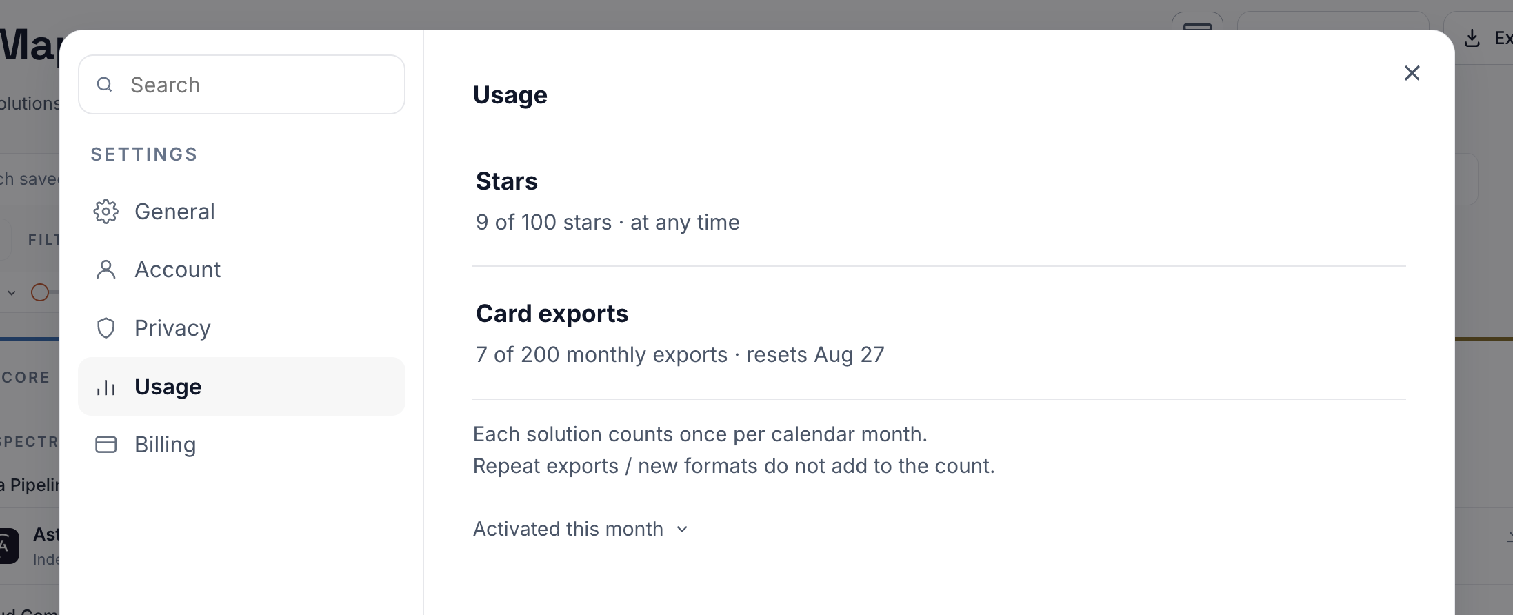 The Settings modal open on the Usage section showing the star count, the card export tally, and the Activated this month list